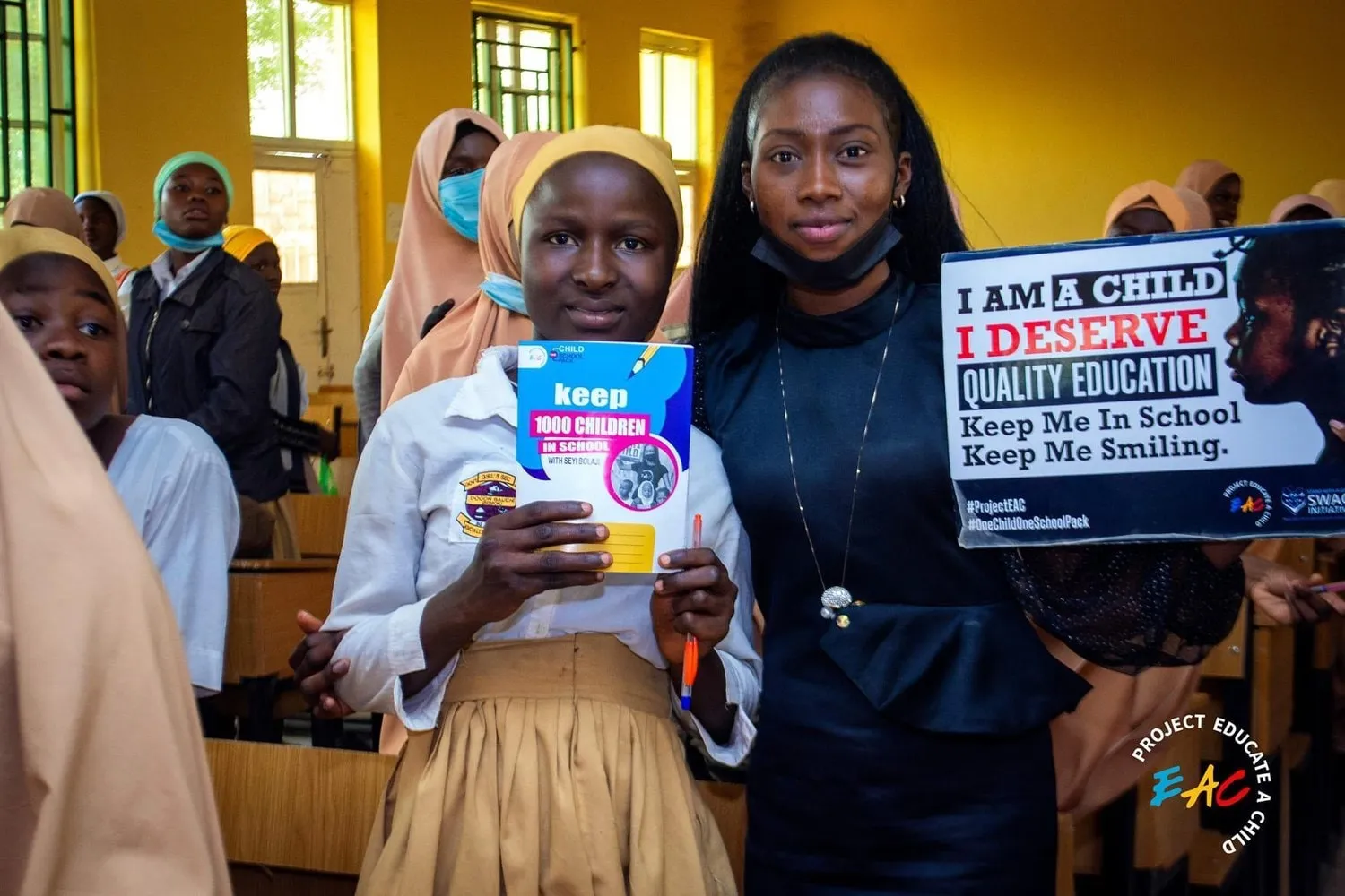 Seyi+&+girl+at+ProjectEAC+Outreach